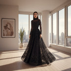 Black sheer evening gown with long sleeves and a flowing skirt on a neutral background