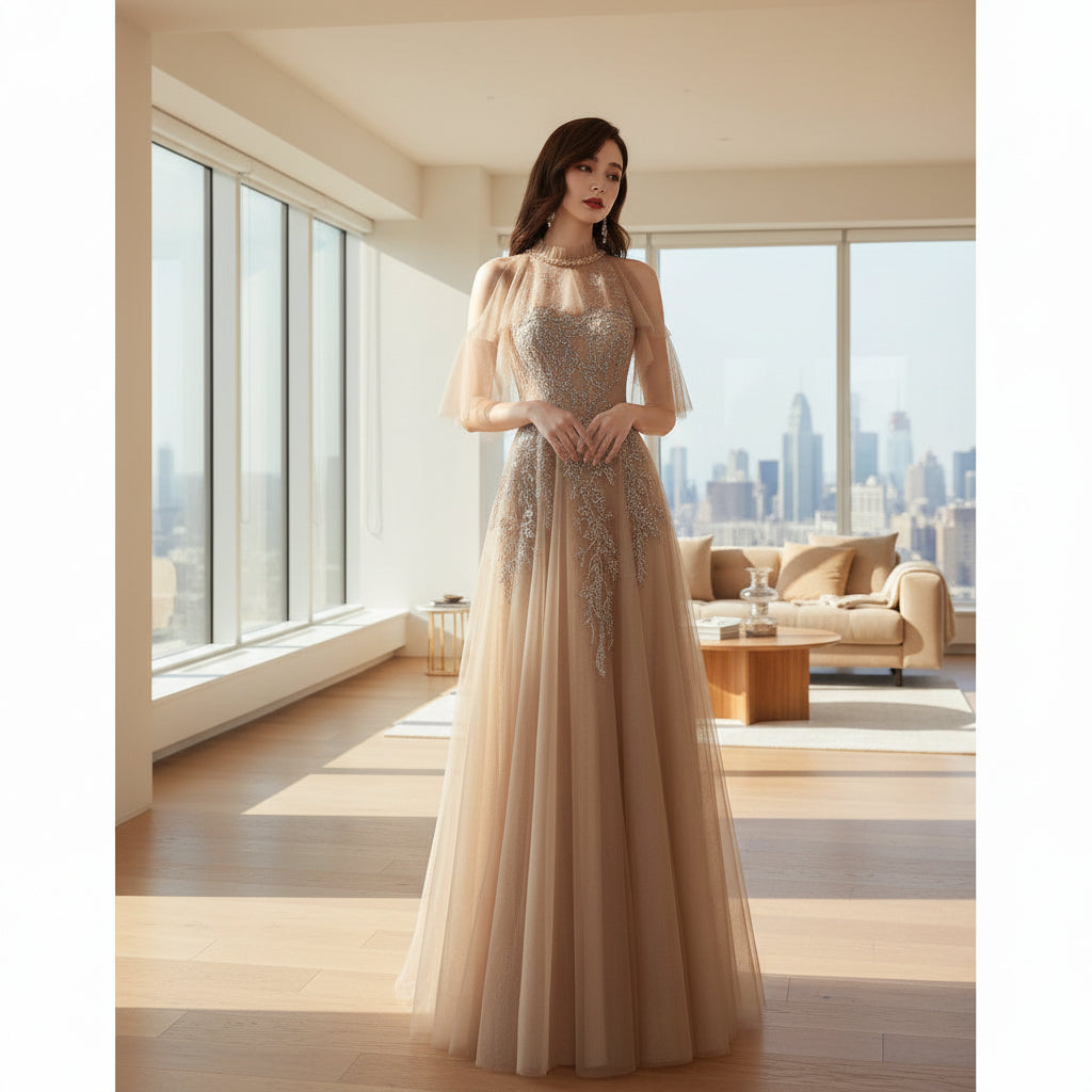 Woman wearing a glamorous evening gown with intricate detailing against a dark background