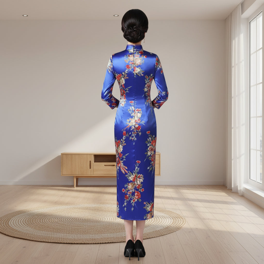 Woman in a traditional floral dress standing in a room with wooden furniture and decor.