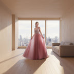 Pink evening gown with beaded top on a model against a white curtain background