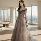 Woman wearing a gray evening gown with intricate detailing on a white background